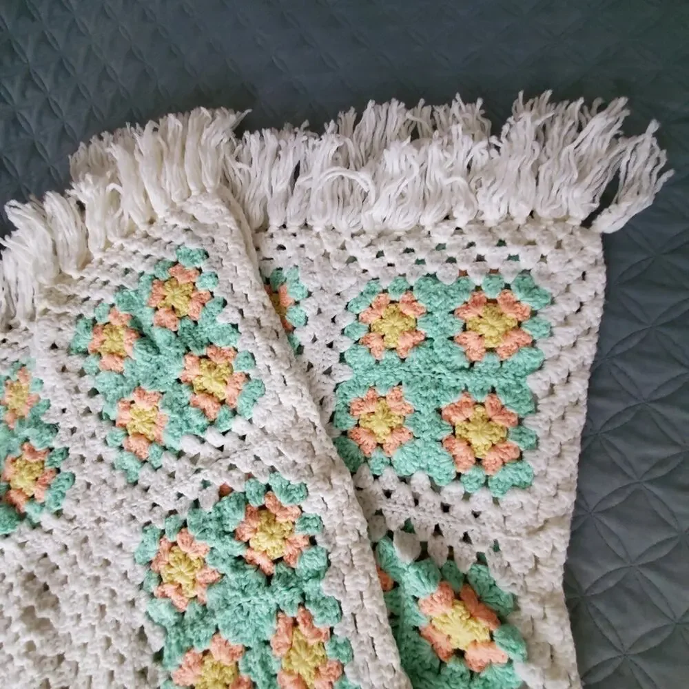 Handmade Crocheted White and green, peach colored yarn fringe throw blanket